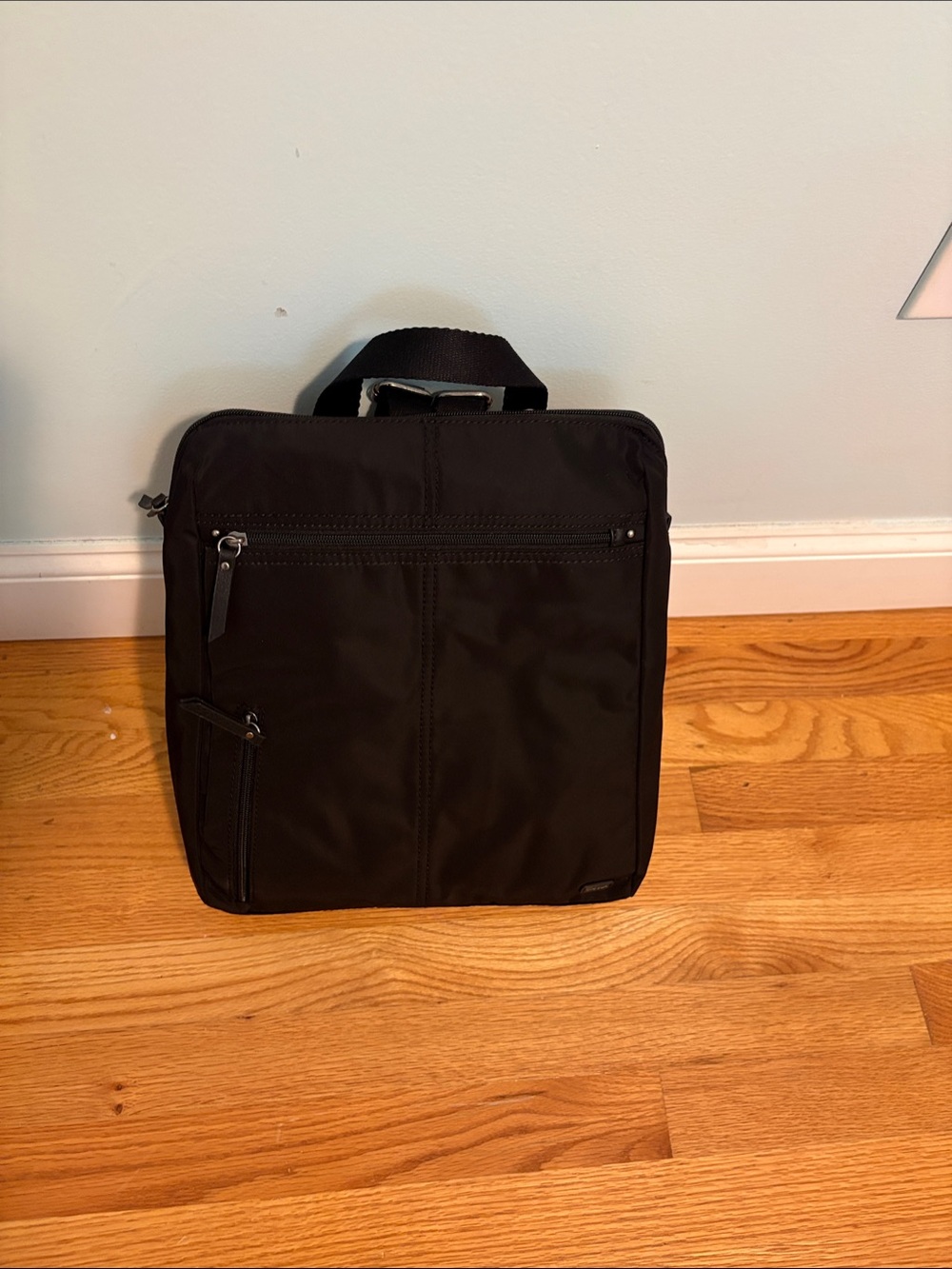 NWT The  Sak Esperato Nylon Backpack in Black can be used by anyone.
